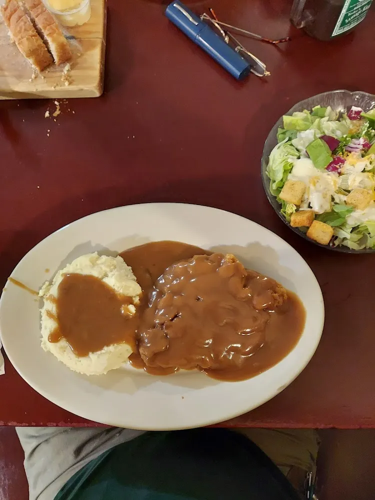 Chicken Fried Steak with Mashed Potatoes and Brown Gravy All Over